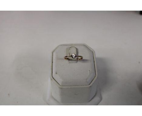 A 9ct gold diamond solitaire ring size O 1/2 