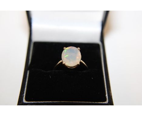 A 9ct gold and opal solitaire ring size O 