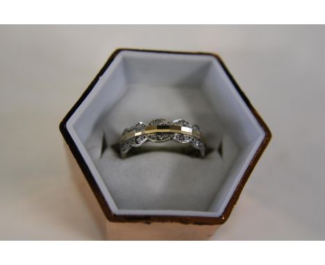 A 9ct yellow &amp; white gold ring set with diamonds size P 