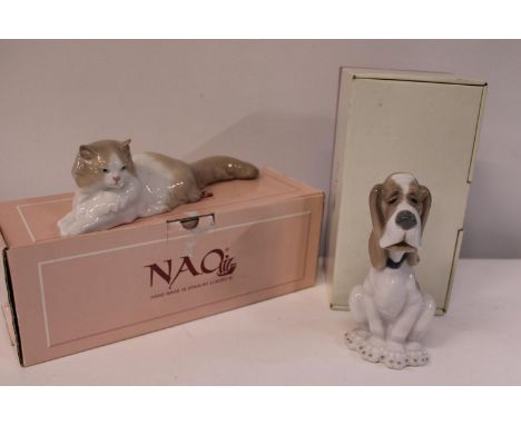 Two boxed Nao figures, dog is 19cm tall &amp; cat is 26cm long 