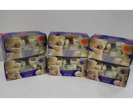 Six boxed limited edition Lurpak egg cups 
