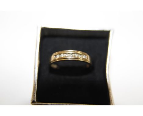 A 9ct gold &amp; diamond half eternity ring size P 1/2 