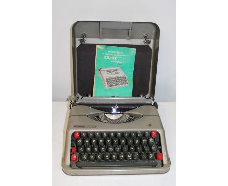 A vintage Empire "Aristocrat" portable typewriter 