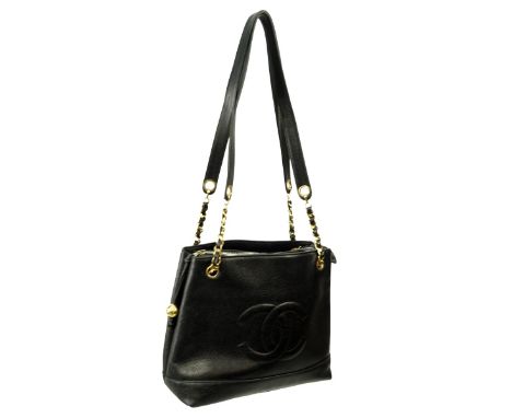 Chanel Black Leather Vintage Shoulder Tote with Front logo and Sphere Pull. Gold tone hardware. Black leather interior. Label