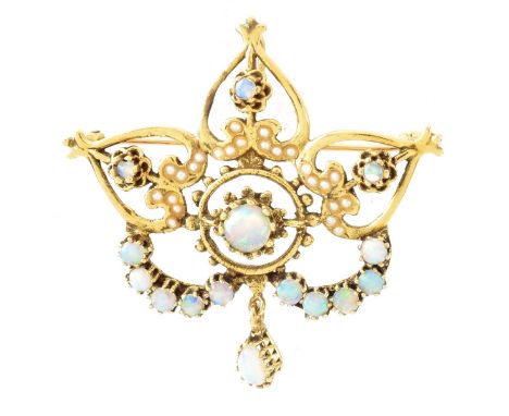 Vintage 15 Opal, Seed Pearl and 14 Karat Yellow Gold Pendant / Brooch. Opals with good play of multi color. Stamped 14K. Meas