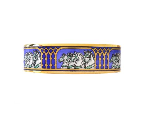 Hermes "Equestrian" Gold Tone Enamel Bangle Bracelet. Signed. Original box included. Measures 2-1/2" dia x 3/4" W. Condition: