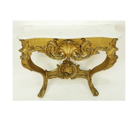 Antique Italian Giltwood Carved Marble Top Console Table. Decorated with swirl accent and shell accent en center. Measures 30