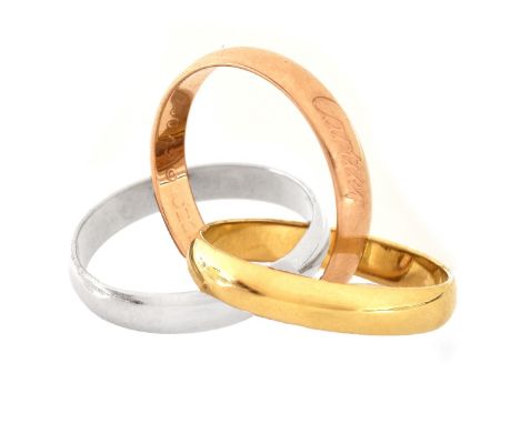 Cartier 18 Karat Trinity Ring. Size 5. Signed Cartier 750. Weighs approx. 7.3 grams. Condition: Very good condition Estimate:
