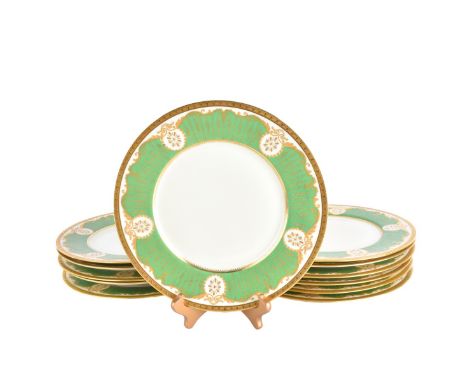 A Set of Twelve (12) Black Knight Bavaria Louis XVI Porcelain Plates. Signed to base. Each with fine gold painted decor on ja