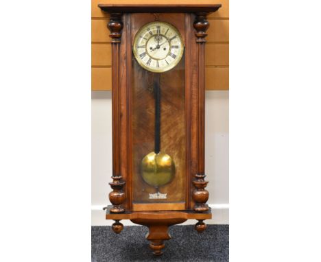 VIENNA STYLE PENDULUM WALL-CLOCK in mahogany with ivorine dial bearing Roman numerals, 105cms high