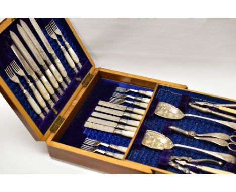 CUTLERY & UTENSIL SET IN BRIGHT-CUT EPNS & MOTHER-OF-PEARL contained within a fitted two-layer mahogany box, the set includes