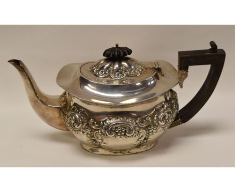 SILVER TEAPOT, the body with raised decoration and with composition handle and knop, Birmingham, 17.7ozs