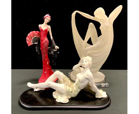 An Art Deco style figure, scantily clad maiden; others (3) 
