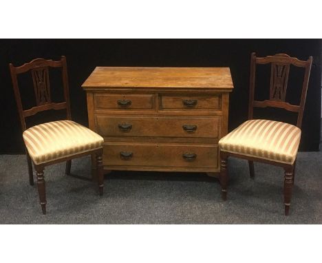 An Edwardian light oak chest of two short over two long drawers, bracket feet, Art Nouveau drop loop handles, 52cm high, 99cm