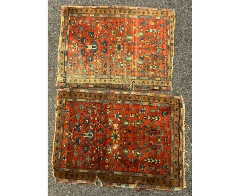 Rugs -  a near pair of small antique Persian Prayer rugs, each with a central floral panel with red ground, within stepped bo
