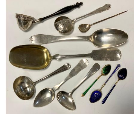 A silver sifter spoon, London 1829;  silver tea infusers;  three silver gilt and enamel coffee spoons;   Continental silver s