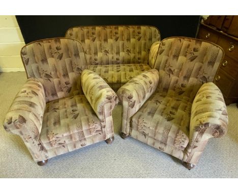 An early 20th century Chesterfield sofa and two side chairs, oak bun feet, c.1930 