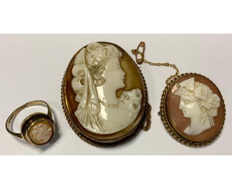 Jewellery - A late Victorian style shell carved cameo brooch, Minerva's head, gilt metal mount;  another larger;  similar rin