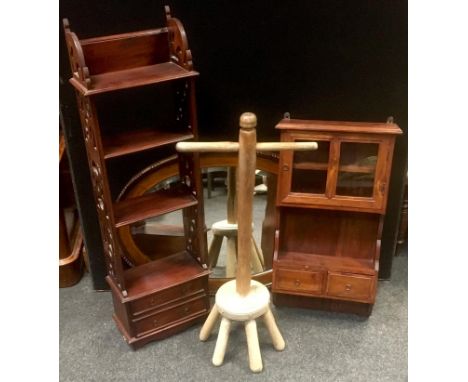 A hardwood wall shelf with short drawer to base; a wall cabinet; a set of dolly legs; an oak oval mirror 