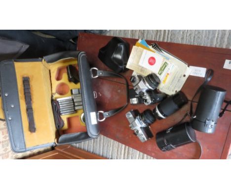 CAMERA CASE INCLUDING AN OLYMPUS OM10 CAMERA, A MINOLTA SLR CAMERA + OTHER EQUIPMENT