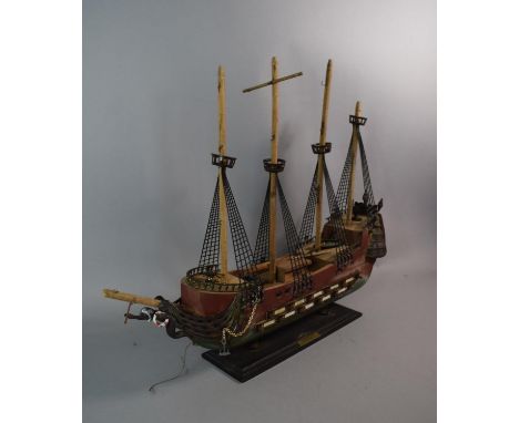 A Vintage Wooden Model of a 16th Century Four Masted Warship, 61cm Long 