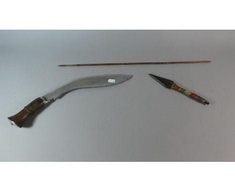 A Vintage Kukri Knife, Carved Wooden Spear and a Poison Dart Arrow 