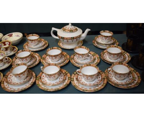 A Collection of Ten Royal Albert Trios, Three Cups af, Together with a Devon Teapot 