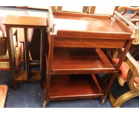 A lot comprising a mid 20th century teak three tiered trolley, 92cm high x 69cm long x 38cm deep and a teak CD rack, 80cm hig