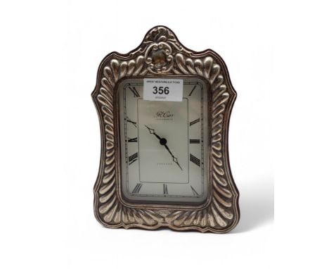 A silver mounted wooden clock, by Carr's of Sheffield, 1992 Condition Report:Available upon request