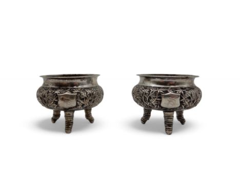 A pair of Chinese silver salts, of cauldron form, with bamboo decoration, on three naturalistic feet, 78gms (2) Condition Rep