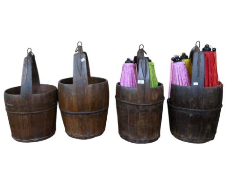 A mixed lot to include four assorted oriental hardwood water buckets, five multicoloured oriental light shades and two brass 