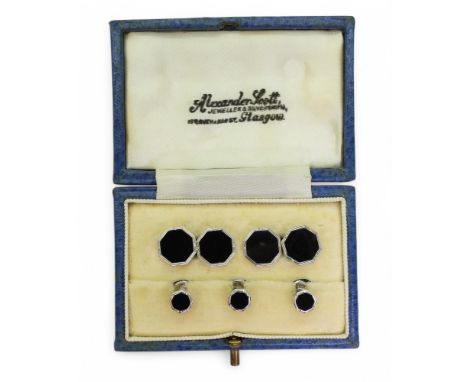 A set of 9ct white gold cufflinks and shirt studs, in original box, weight all together 8.8gms. London hallmarks 1963, makers