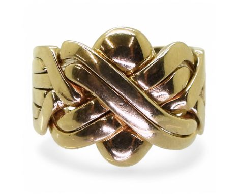 A heavy gauge 9ct gold, six piece puzzle ring. Finger size U, weight 13.2gms Condition Report:very light wear, and a very nic