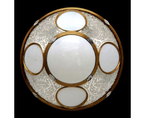 A 20TH CENTURY DECORATIVE CEILING LIGHT with circular white glass panels, within a gilt and silvered metal convex frame with 