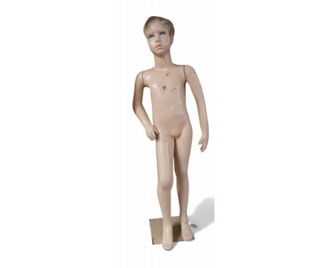 A fibre glass boy mannequin Condition Report:We would recommend you view these items personally for condition as no report av