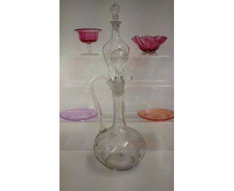 Group of glassware to include a Mary Gregory decanter, Cranberry glass and and an early etched claret jug 