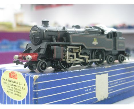 A Hornby Dublo Three Rail EDL18 4-6-2 Standard Tank, R/No. 80054, fair/good. Boxed with inserts, box lid poor.