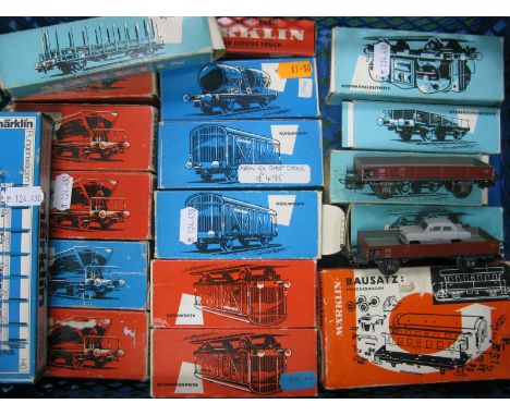 A Quantity of 'HO' Scale Marklin Wagons, all boxed, hoppers, line wagons, low sided with Ford car noted, etc, fair. (18)