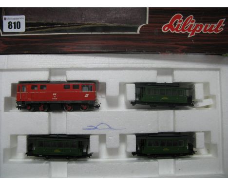 A Boxed Liliput HO - E #733 Train Pack, comprising of OBB Bo - Bo electric locomotive R/no 2095-15, red livery, three liestal