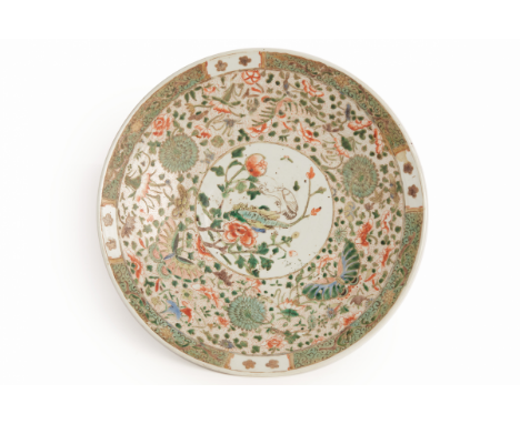 Kangxi iron red six character mark to base, but probably 19th Century Decorated with a crane amongst flowering branches withi