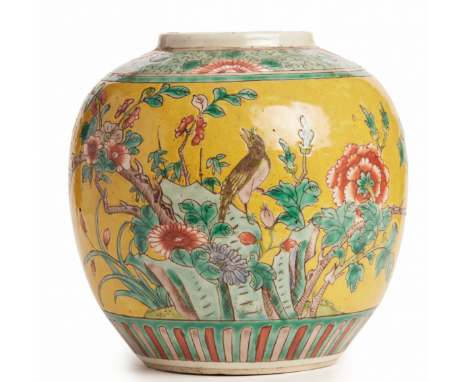 Kangxi iron red six character mark to base, but probably 19th Century Rich yellow ground, decorated with songbirds and peonie
