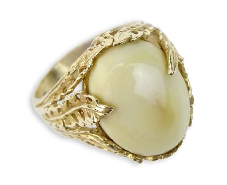 Antique Cabochon Walrus Ivory and 14 Karat Yellow Gold Ring. Signed 14K. Good antique condition. Ring size 7. Approx. weight: