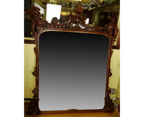 Large Renaissance style Carved Wood Beveled Wall Mirror. Small repair to finial, normal age splits or else good condition. Me