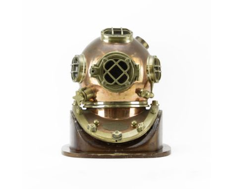 Morse Diving Equipment Inc. U.S. Navy Mark V Brass and Copper Diving Helmet.  Includes wooden stand. Originates from Boston, 