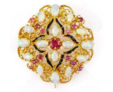 Vintage 18 Karat Yellow Gold, Opal, Ruby and Enamel Pendant/Brooch. Set with sixteen (16) oval cut opals measuring 6mm x 4mm 