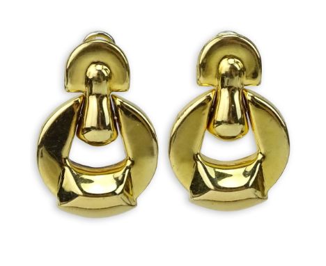 Pair of Vintage Italian 14 Karat Yellow Gold Door Knocker style Earrings. Signed. Good vintage condition. Measure 1-1/2" L, 1