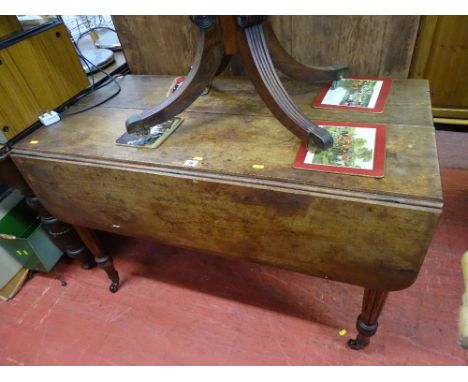 Vintage Pembroke table on pot castors