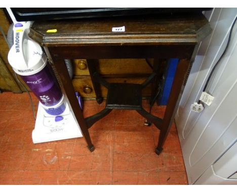 Small octagonal occasional table with lower centre square shelf