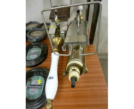 Two 20th Century ceramic top bar pulls/pumps