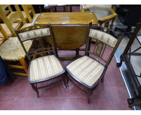 Compact barley twist gate leg table and two inlaid and classically upholstered bedroom chairs